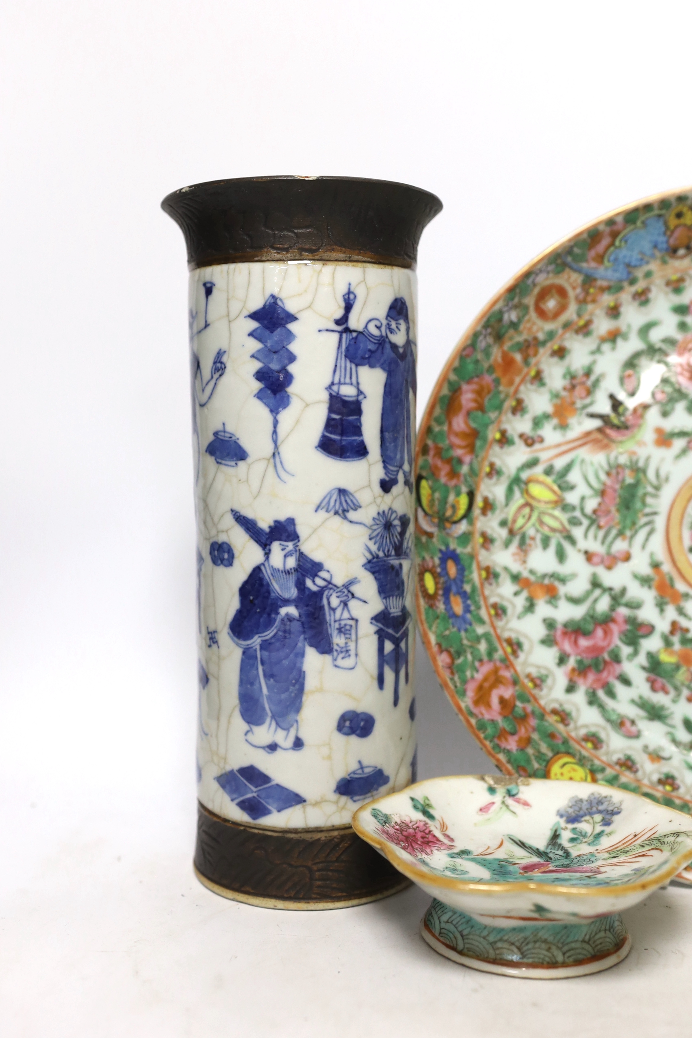 Five Chinese porcelain items including a blue and white crackle glaze cylindrical vase and a celadon glaze tea bowl and stand, largest 29cm in diameter